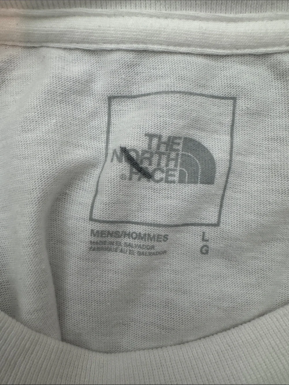 The North Face White Tee with Red & Blue Karakoram Graphic